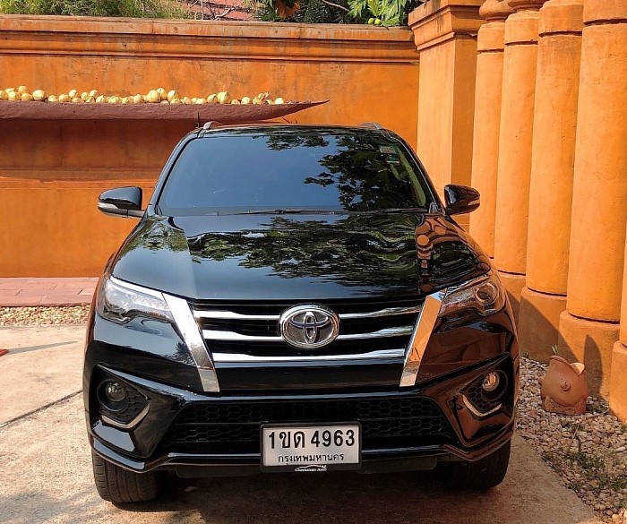 Toyota Fortuner SUV. Travel to other provinces quickly and safely. Call me +6665 269 5883 MR.one. Car charter all over Thailand.